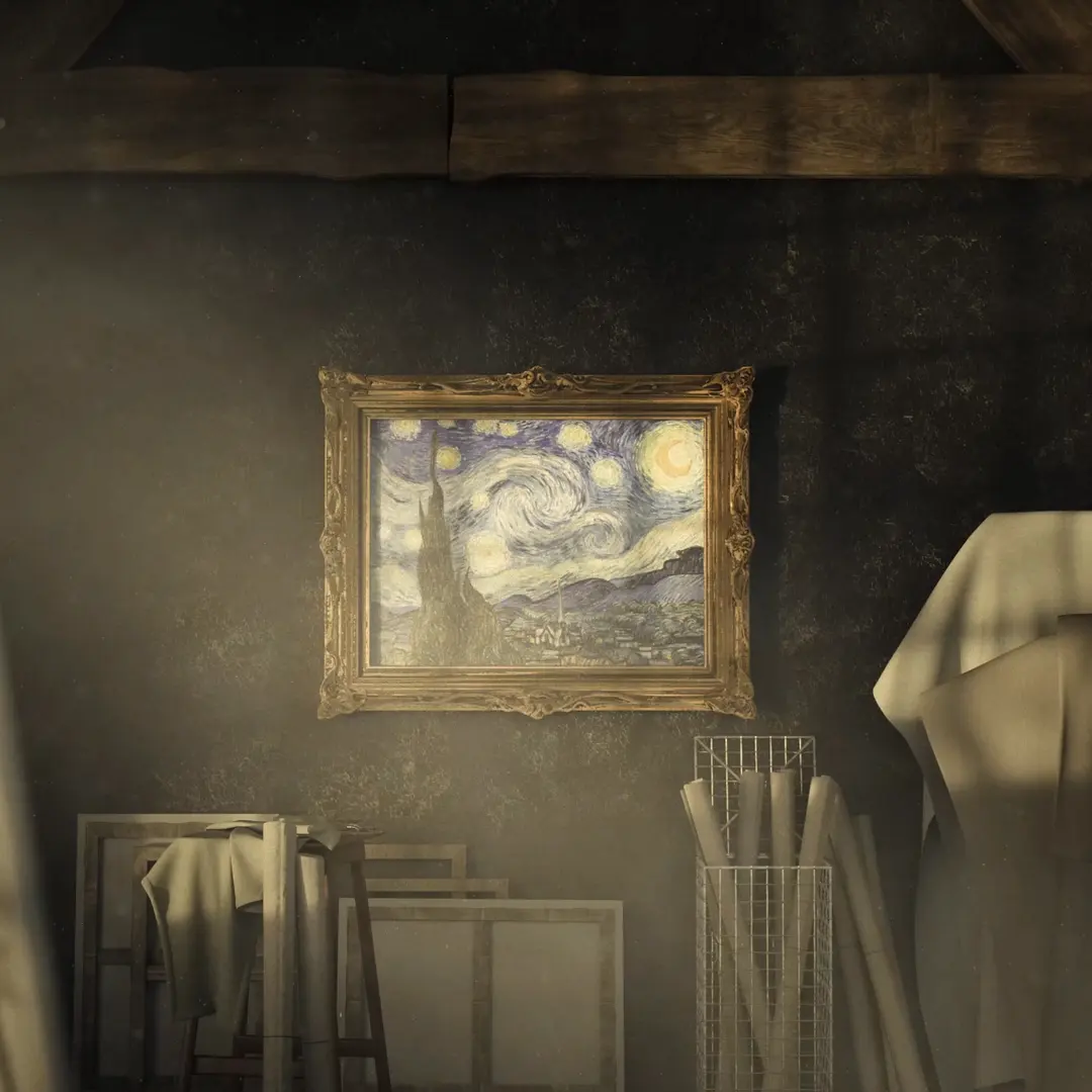 Framed reproduction of Van Gogh's Starry Night hanging on a dark wall in an artist's studio with canvases, fabric, and drawing rolls.