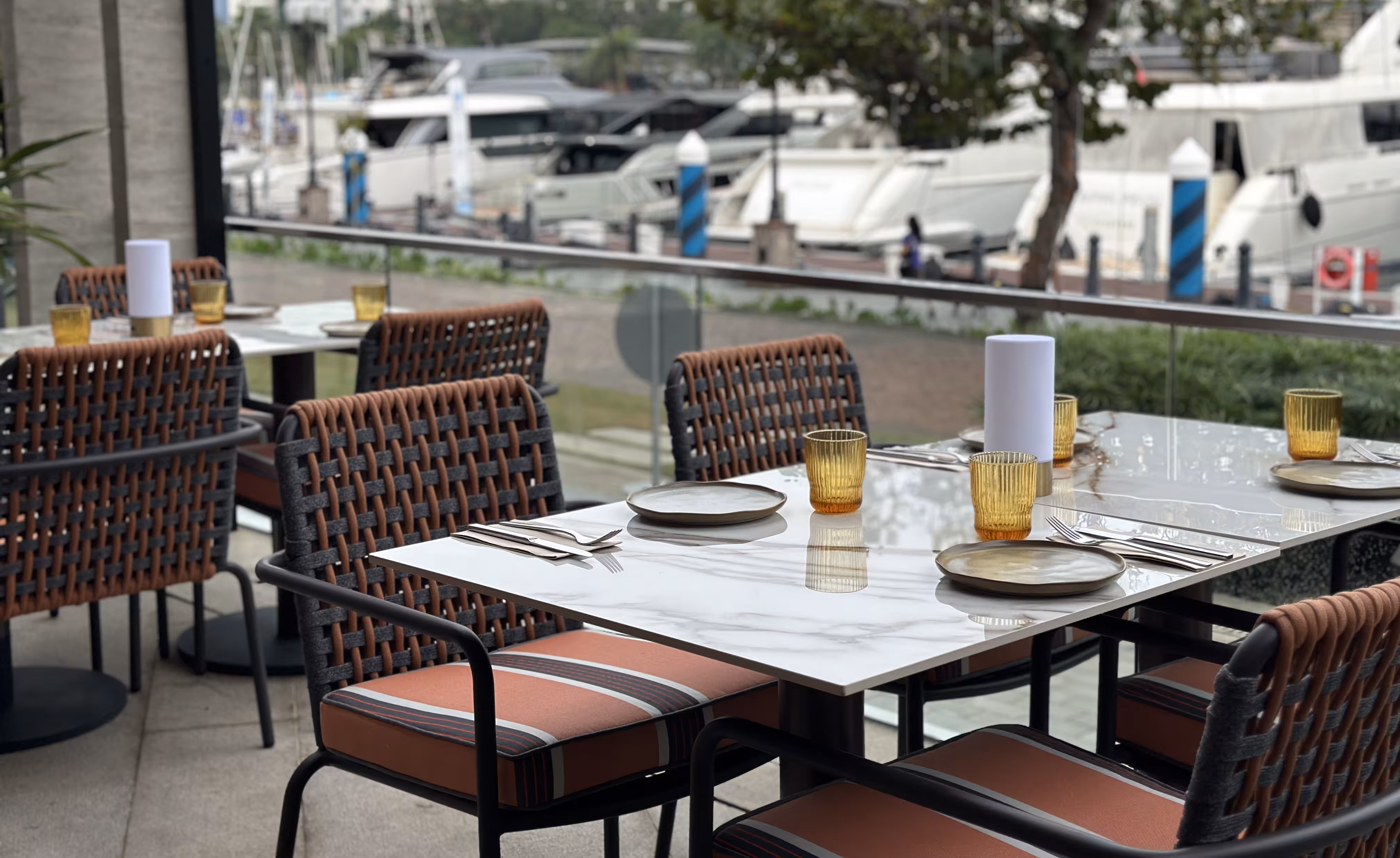 Latitude Bistro interior at ONE°15 Marina Sentosa Cove showing the redesigned dining environment.